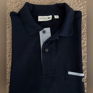 Lacoste Men's Dark Blue Polo with chest pocket in Light Blue Accents